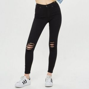 Topshop black ripped knee Jamie jeans